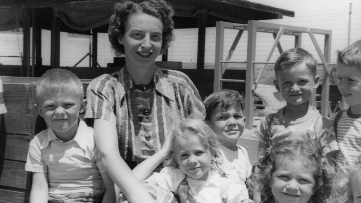 Nursery school supervisor Beryl Campbell with children, 1940s.