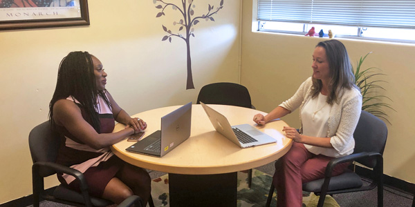 Dr. Sascha Longstreth (right) with Dr. Idara Essien, assistant professor of child and family development.
