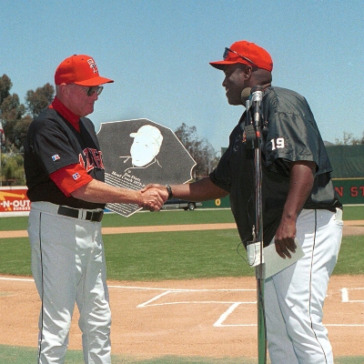 Jim Dietz sakes hands with Tony Gwynn.