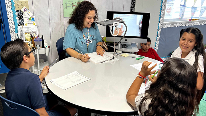 Rafdely Aguilar teaches a math lesson.