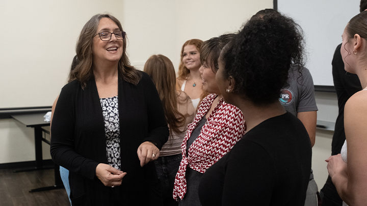 Dr. Lisa Gates with leadership students