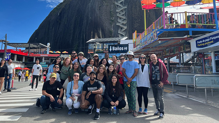 The MFT cohort poses in front of El Peñón de Guatapé.