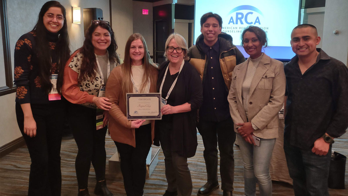 Regina Choy with classmates and faculty in Toronto