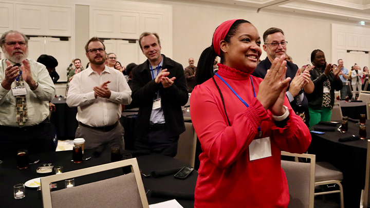 Guests applaud student performers at the US PREP Learning Tour welcome dinner.