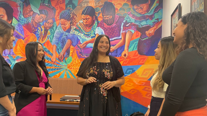 Felisha Herrera Villarreal (center) shared a laugh with RES-ISTE research team members (from left) Griselda Paredes, Victoria C. Rodriguez-Operana, Elizabeth Nguyen and Daniela Hernandez at the Latinx Resource Center. 