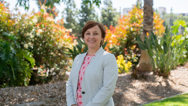 A portrait of Erin Rivera on the SDSU campus