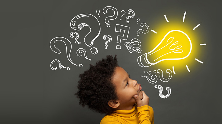 black child thinking with a light bulb graphic above his head