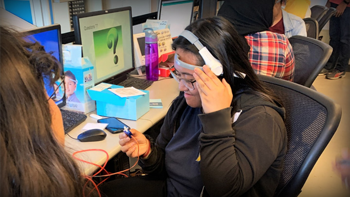 student working with neuroengineering equipment