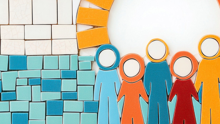 tiles in shape of family next to ocean